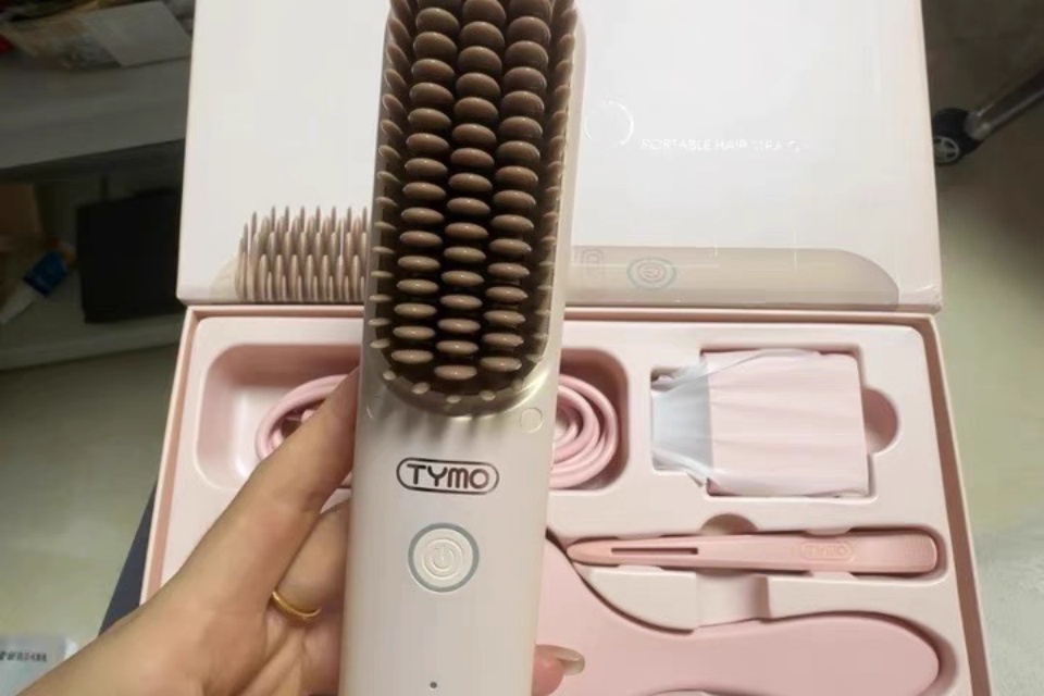 Electric straightening comb